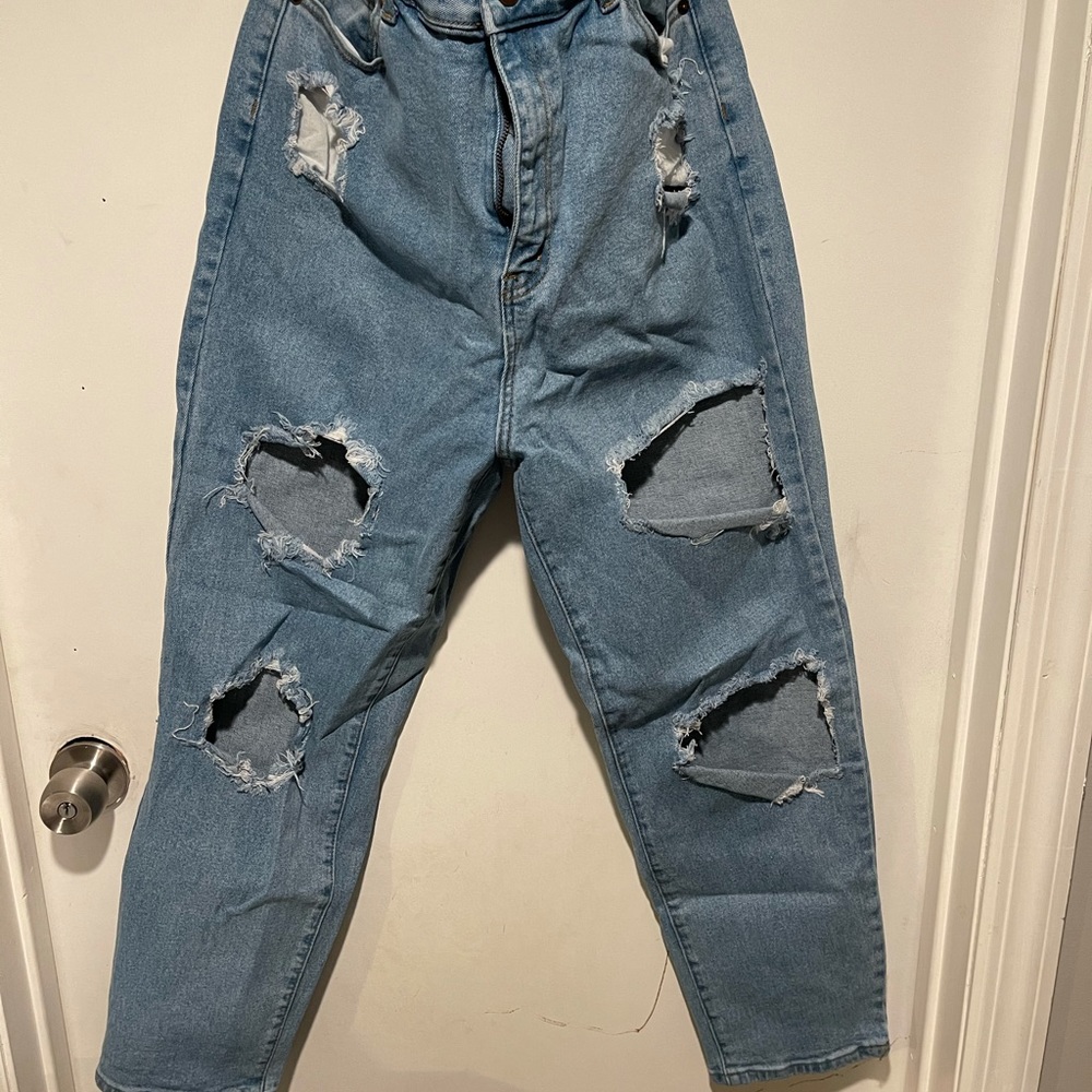 Fashion Nova.  Ripped, high waist jean pants